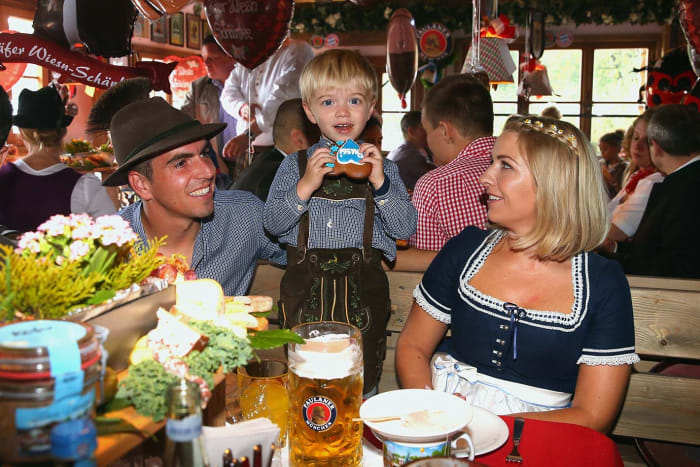 Philipp-Lahm-wife-Claudia-son-Julian-Oktoberfest-490649320.jpg